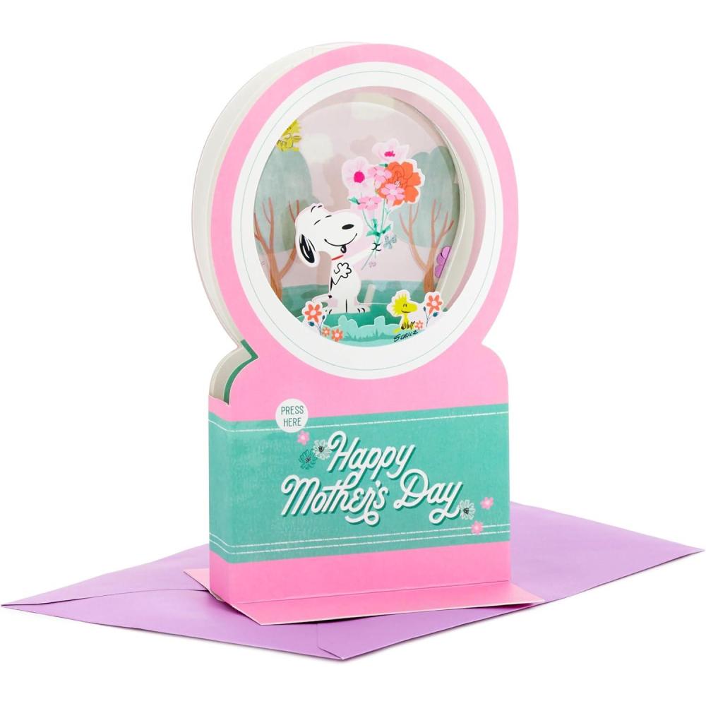 imageHallmark Paper Wonder Peanuts Mothers Day Pop Up Card with Music Snoopy Snow Globe Plays Instrumental MusicSnoopy Snow Globe  Plays Instrumental Music
