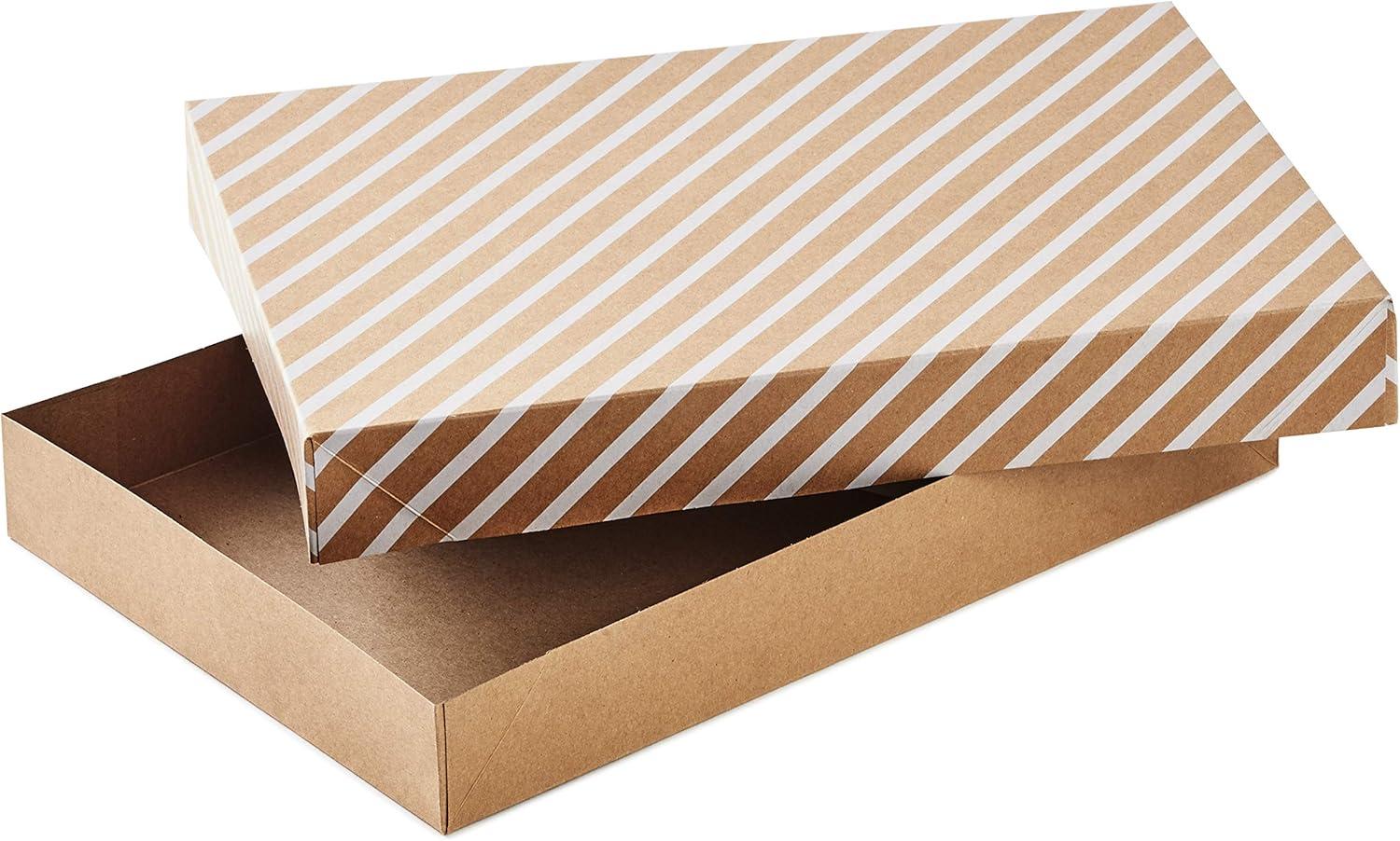 imageHallmark Medium Christmas Gift Boxes with Lids 12 Shirt Boxes White Snowflakes and Stripes on Kraft for Holiday Parties Winter Weddings Bridal Showers12 Count Pack of 1