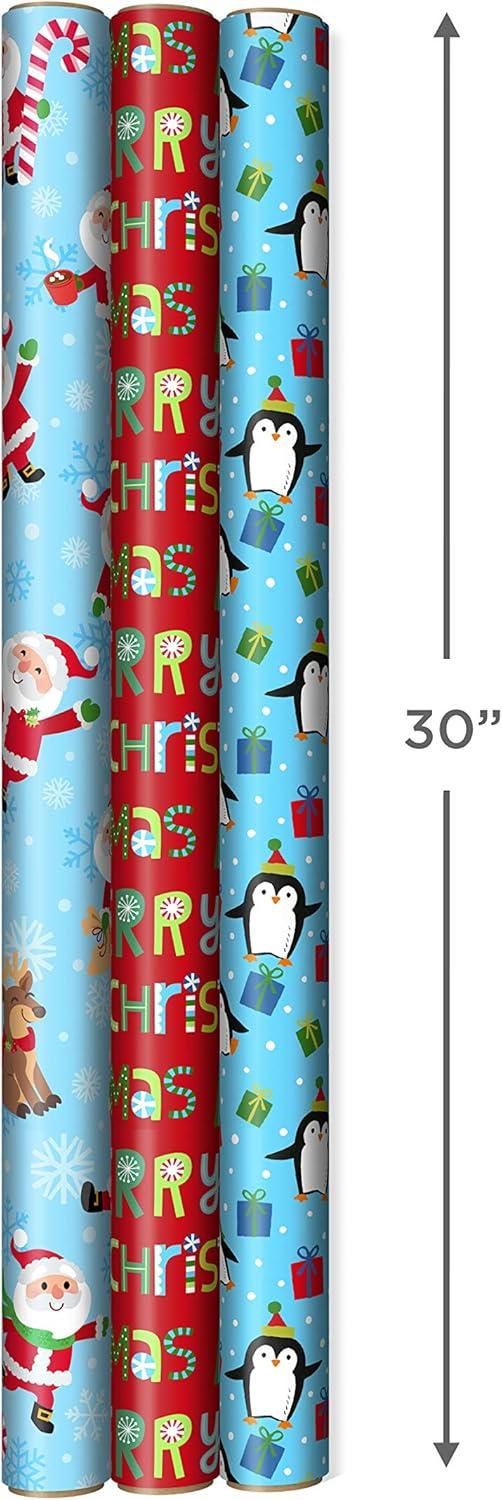 imageHallmark Trendy Reversible Christmas Wrapping Paper for Kids 3 Rolls 120 sq ft ttl Dinosaurs Koalas Polar Bears Penguins Camels Zebras StripesPenguins  Santa  Trees  Stripes  Snowflakes  Merry Christmas