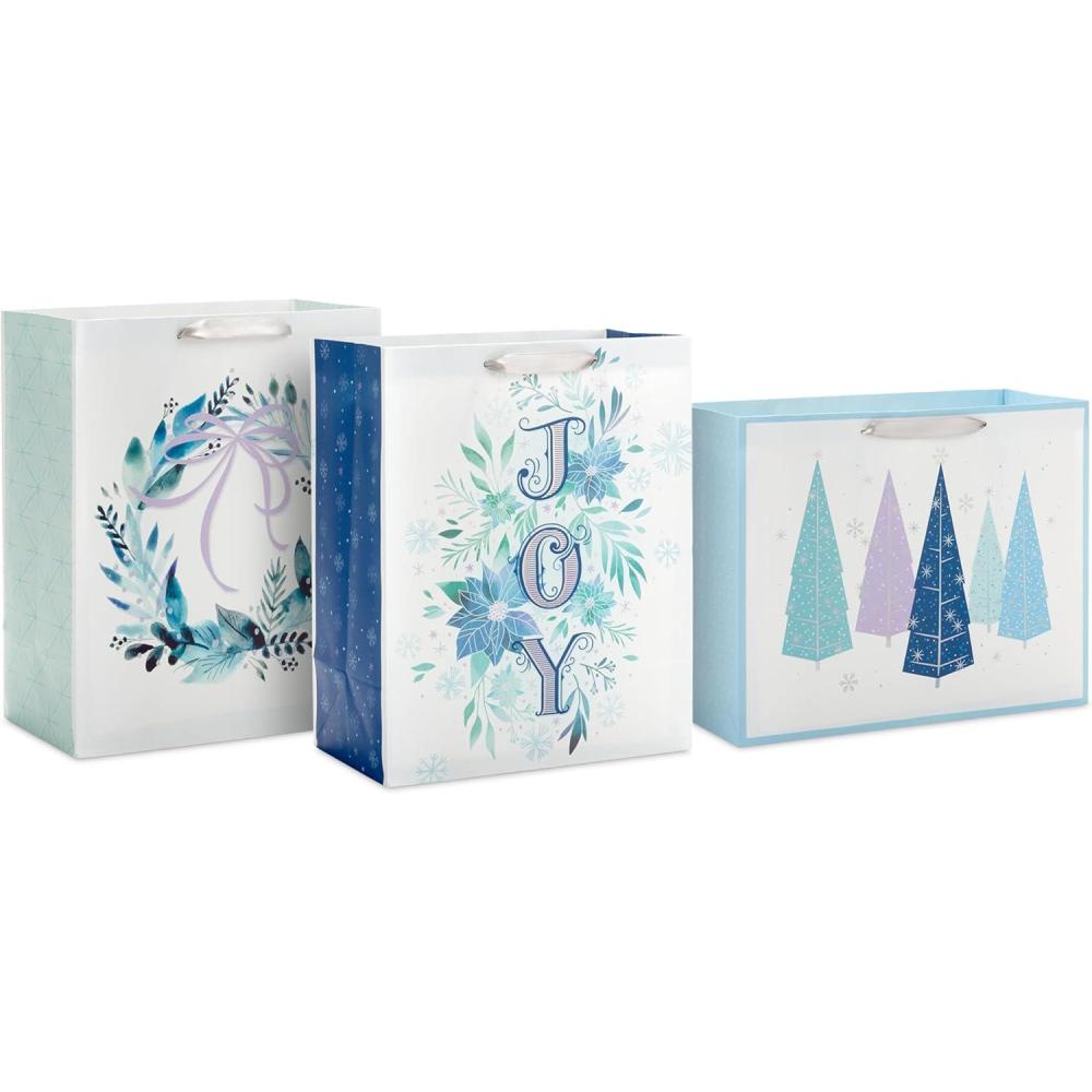 imageHallmark 17quot Extra Large Blue Gift Bags with Tissue Paper 3 Gift Bags Starry Snowflakes on Navy for Winter Weddings Birthdays Housewarming Gifts1 Count Pack of 3
