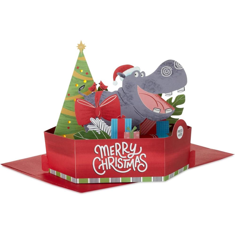 imageHallmark Paper Wonder Musical 3D PopUp Christmas Card With Light Happy Hippo Under the Tree