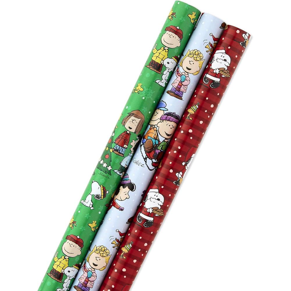 imageHallmark Peanuts Wrapping Paper Rolls for Birthdays Easter Christmas Set of 3 Rolls 60 Sq Ft Total Snoopy Charlie Brown Woodstock Green Blue RedChristmas Wrapping Paper