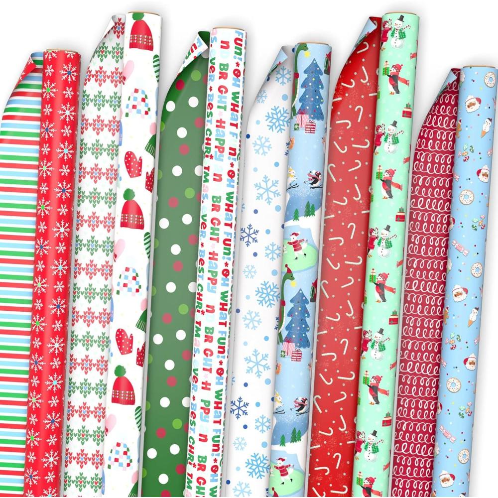 imageHallmark Reversible Christmas Wrapping Paper Rolls for Kids 6 Rolls 150 Sq Ft Total Cookies Donuts Mittens Penguins DinosaursReversible Christmas