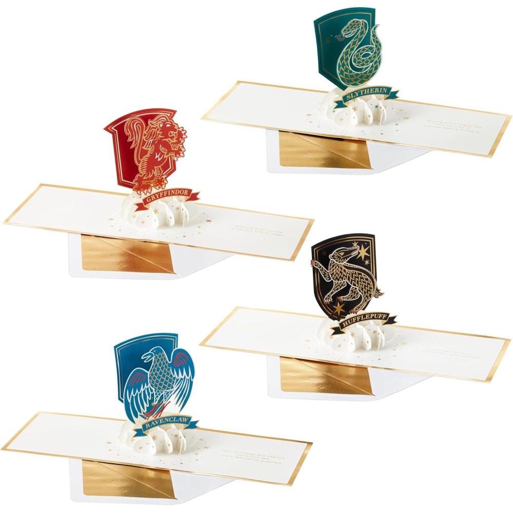 imageHallmark Signature Paper Wonder Harry Potter Pop Up Card Assortment 4 Cards with Envelopes Hogwarts House Crests