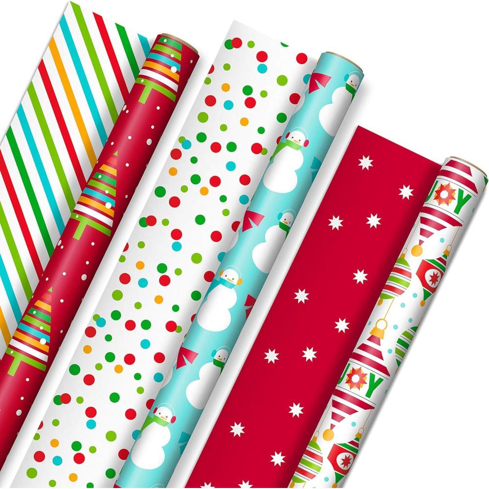 imageHallmark Trendy Reversible Christmas Wrapping Paper for Kids 3 Rolls 120 sq ft ttl Dinosaurs Koalas Polar Bears Penguins Camels Zebras StripesVibrant Brights  Stripes  Trees  Ornaments  Polka Dots