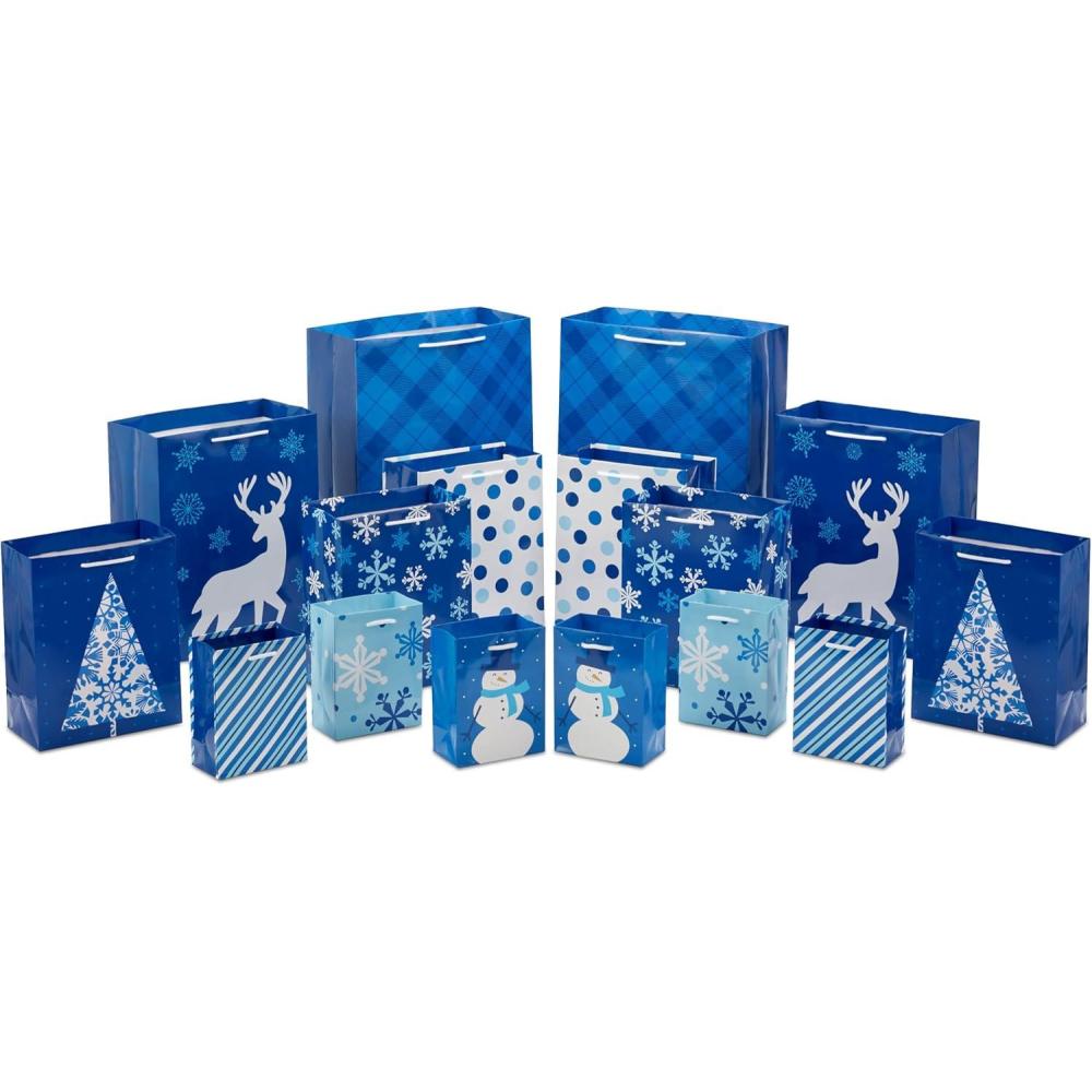 imageImage Arts Assorted Christmas Gift Bags Bulk  Blue Plaid Snowman Deer Tree Snowflakes 16 Bags 6 Small 5quot 6 Medium 8quot 2 Large 11quot 2 XL 14quot for Holiday Parties Hanukkah WeddingsBlue Plaid  Stripes  Snowman  Deer  Snowflake  Dots