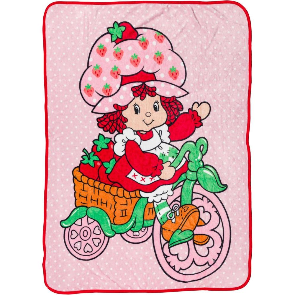 imageSilver Buffalo Rainbow Brite Plush Raschel Throw Blanket Featuring Rainbow Land 45quot x 60quotStrawberry Shortcake on Bike