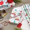 Hallmark Holiday Wrapping Paper Bundle with Cut Lines on Reverse, Elegant Woodland (Pack of 4, 120 sq. ft. TTL) Peace and Joy, Deer, Pinecones, Snowflakes, Blue, Gold(Yeti  Santa  Penguin  Snowflakes  Blue  Gold)