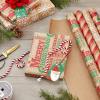 Hallmark Kraft Christmas Wrapping Paper for Kids with Cut Lines on Reverse (4 Rolls: 88 sq. ft. ttl) Penguins, Santa, Snowmen, Polka Dots(Red Trucks  Snowflakes  Red Stripes  Merry Christmas)