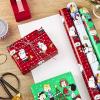 Hallmark Peanuts Wrapping Paper Rolls for Birthdays, Easter, Christmas (Set of 3 Rolls: 60 Sq. Ft. Total) Snoopy, Charlie Brown, Woodstock, Green, Blue, Red(Christmas Wrapping Paper)