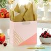 Hallmark Signature Studio 7″ Medium Square Gift Bag with Tissue Paper (Abstract Brushstrokes) Peach, Mint Green, Teal for Easter, Birthdays, Bridal Showers and More(Coral  Blush Pink  Gold Stripes)