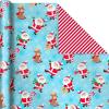 Hallmark Trendy Reversible Christmas Wrapping Paper for Kids (3 Rolls: 120 sq. ft. ttl) Dinosaurs, Koalas, Polar Bears, Penguins, Camels, Zebras, Stripes(Penguins  Santa  Trees  Stripes  Snowflakes  “Merry Christmas”)