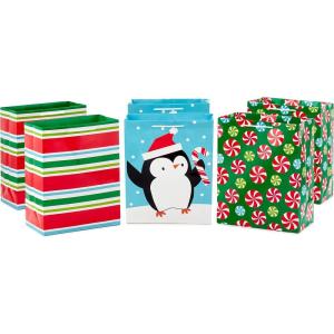 Hallmark Image Arts 11″ Large Christmas Gift Bags (6 Bags Penguins, Stripes, Peppermints) for Kids, Coworkers, Teachers