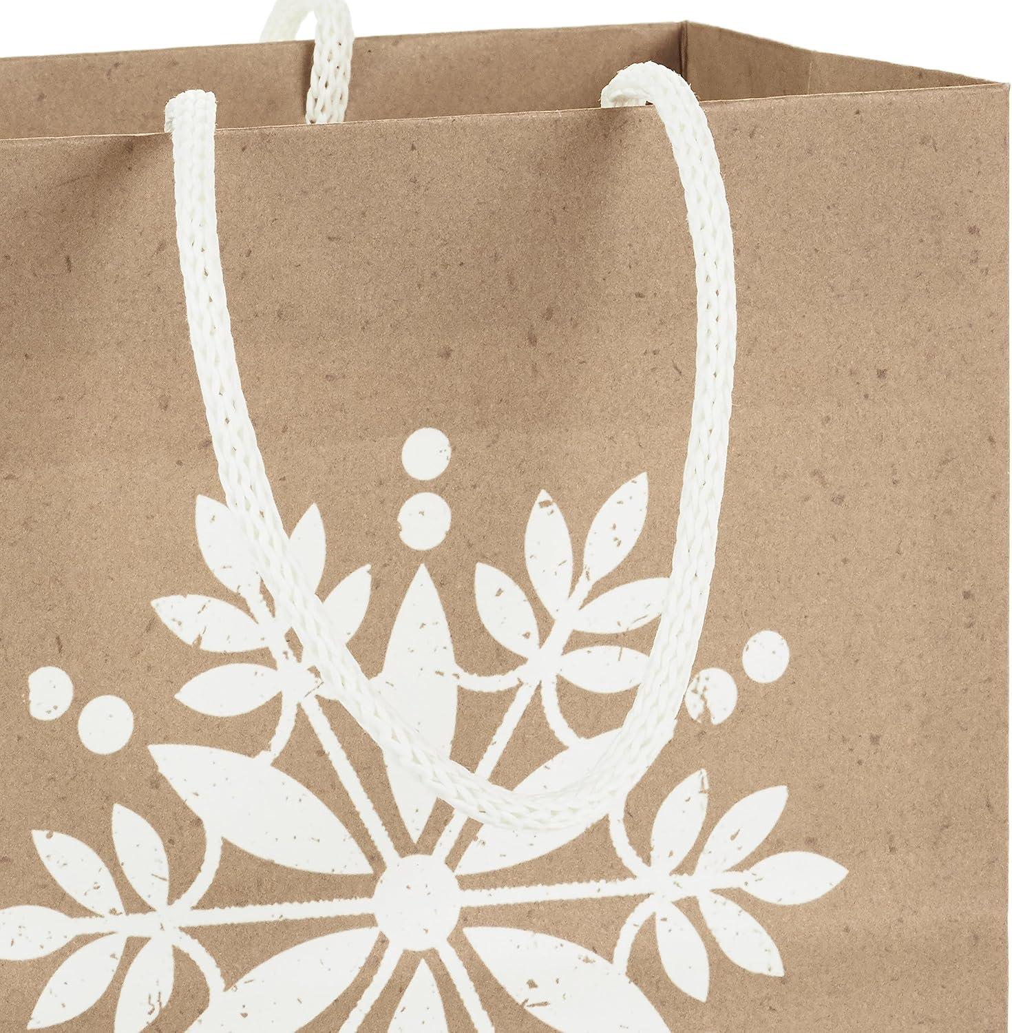 imageHallmark Assorted Christmas Gift Bags Recyclable Kraft Brown with Snowflake Plaid and Trees 8 Bags 3 Small 6quot 3 Medium 9quot 2 Large 13quot for Holiday Parties Hanukkah Winter WeddingsKraft Snowflakes  Plaid  Christmas Trees