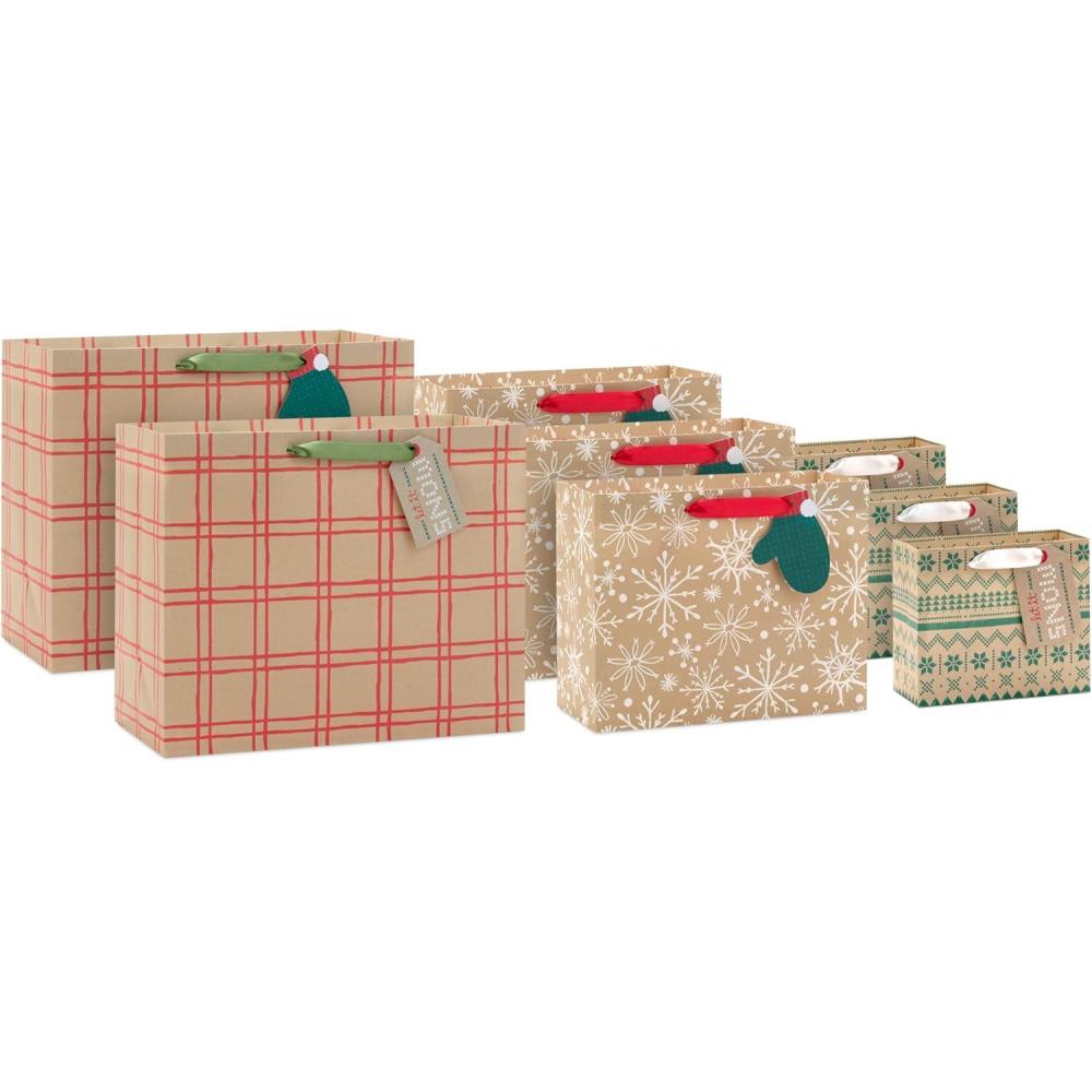 imageHallmark Assorted Christmas Gift Bags Recyclable Kraft Brown with Snowflake Plaid and Trees 8 Bags 3 Small 6quot 3 Medium 9quot 2 Large 13quot for Holiday Parties Hanukkah Winter WeddingsKraft Plaid  Snowflakes  Mittens