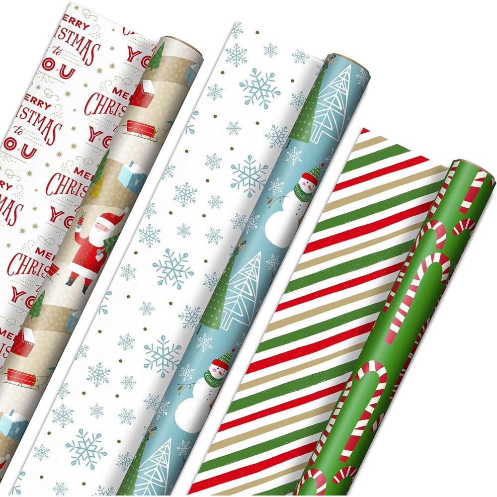 imageHallmark Holiday Wrapping Paper Rolls  Rustic Christmas Gift Wrap Paper Set of 3 Reversible Rolls 120 sq ft ttl Plaid Barn Red Truck Moose Woodland ScenesRustic Santa  Papercraft Snowmen  Candy Canes  Stripes  Snowflakes  Merry Christmas to You