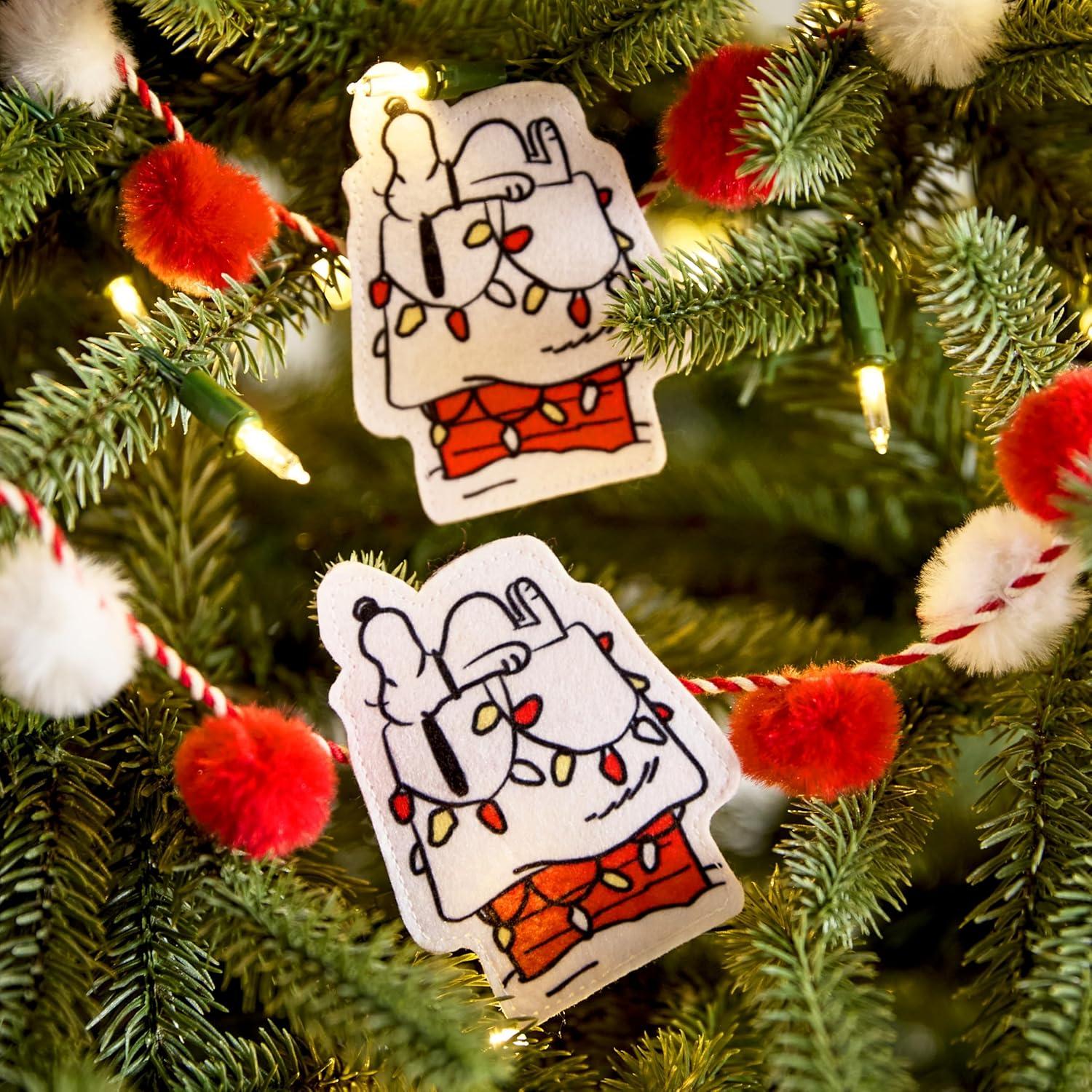 imageHallmark Peanuts Snoopy Doghouse 72quot Christmas Garland Fabric Gifts for Peanuts Fans