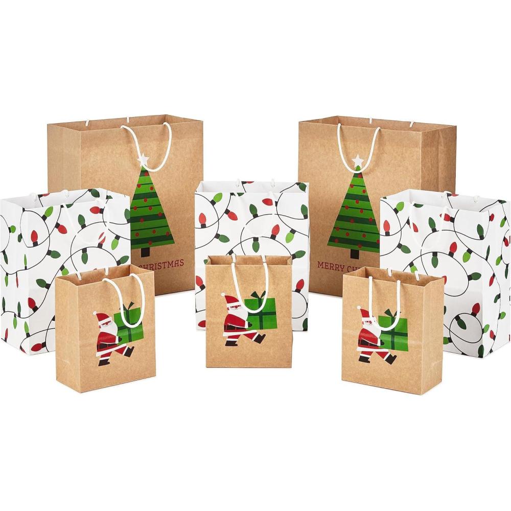 imageHallmark Christmas Gift Bags for Kids 8 Bags 3 Small 6quot 3 Medium 9quot 2 Large 13quot Recyclable Kraft with Santa Lights and Tree