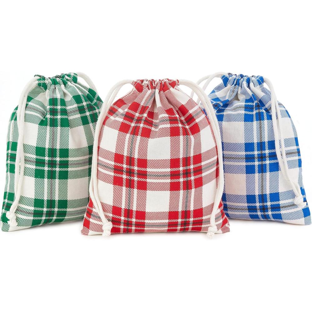 imageHallmark Drawstring Christmas Gift Bag Set 2 Fabric Bags with Drawstrings 1 Medium 10quot 1 Extra Large 20quot Santa Red and White Stripe 5XGB4902Red  Blue  Green