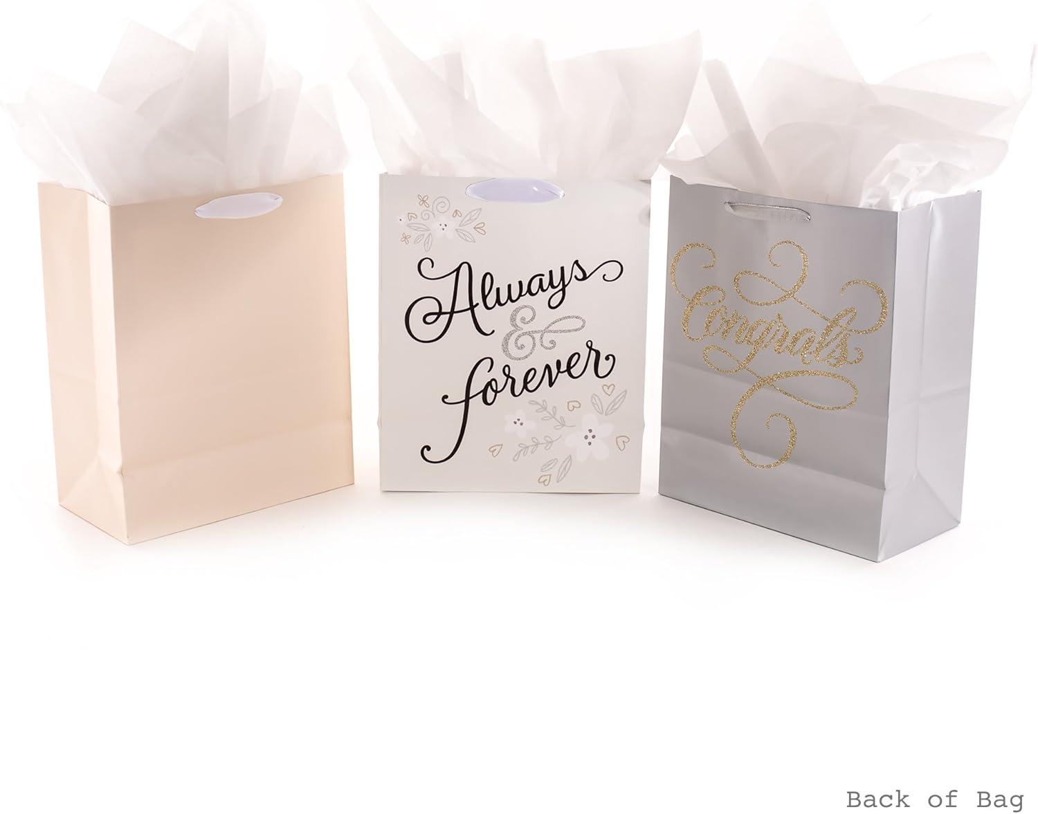 imageHallmark Large Wedding Gift Bags with Tissue Paper Glitter Pack of 3 silver gold white 5EGB6059