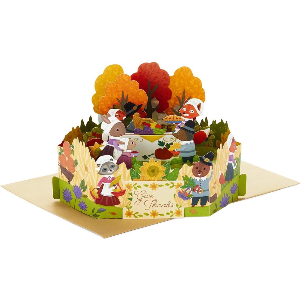 imageHallmark Paper Wonder Displayable Pop Up Thanksgiving Card Woodland FeastPop Up  Woodland Animal Pilgrims