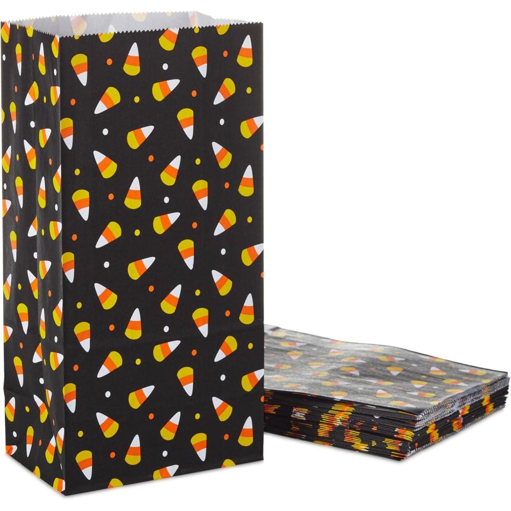 imageHallmark Halloween Party Favor and Wrapped Treat Bags 30 Ct Skulls and Pumpkins Ghosts and Eyes for Trick or Treating Class Parties Luminaries Crafts Da de los MuertosCandy Corn 30 Count