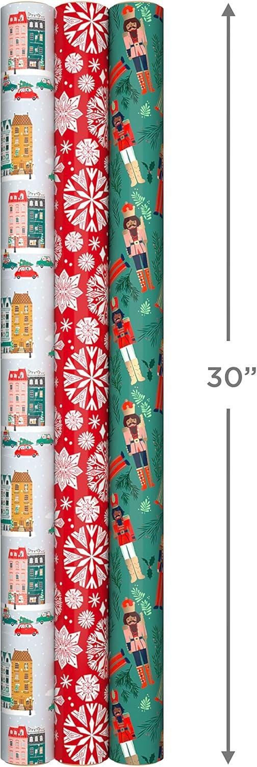 imageHallmark Christmas Wrapping Paper with Cutlines on Reverse 3 Rolls 120 Sq Ft Total Winter City Scene Rustic Snowflakes on Red Nutcrackers with FoliageWinter City Scene Rustic Snowflakes on Red Nutcrackers with Foliage