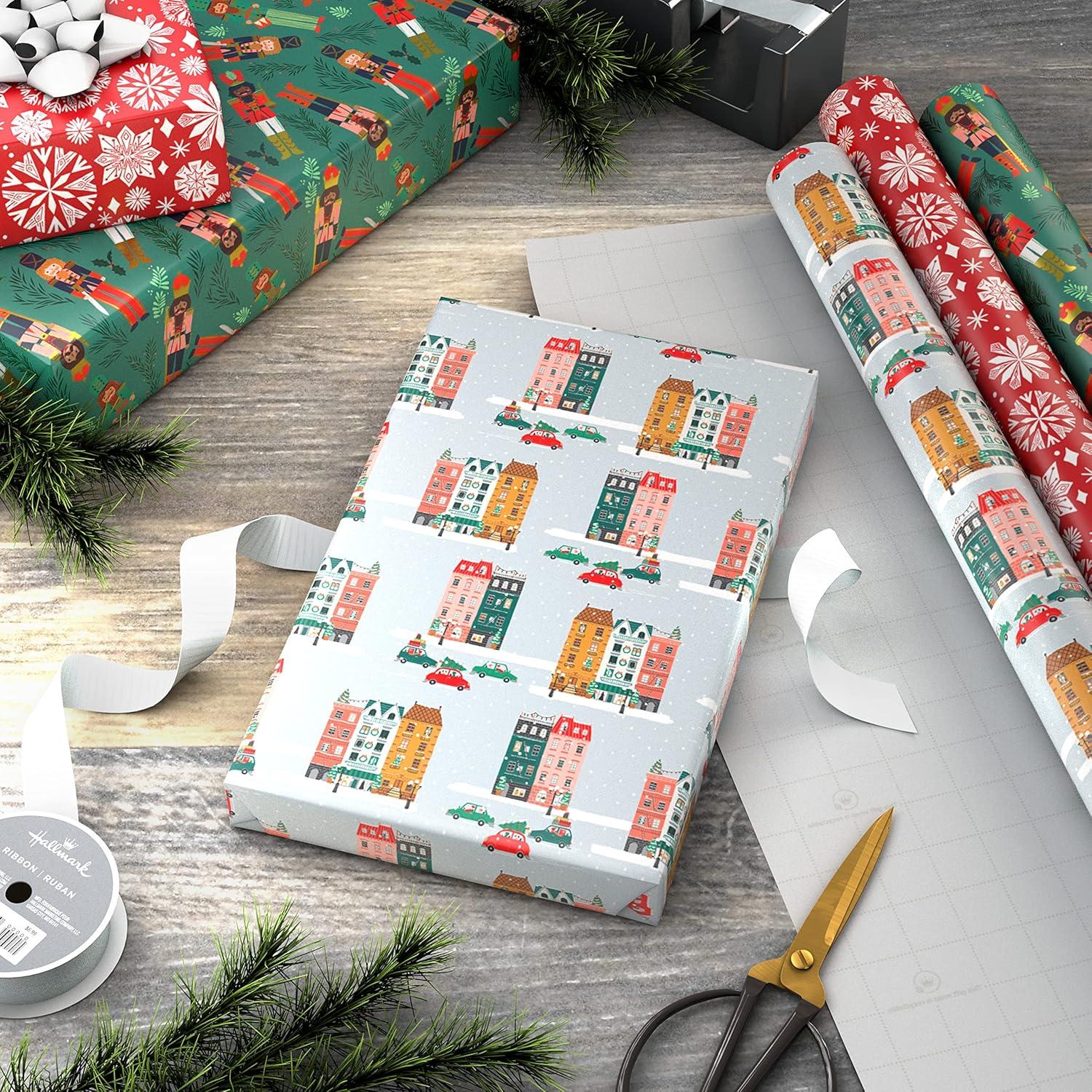 imageHallmark Christmas Wrapping Paper with Cutlines on Reverse 3 Rolls 120 Sq Ft Total Winter City Scene Rustic Snowflakes on Red Nutcrackers with FoliageWinter City Scene Rustic Snowflakes on Red Nutcrackers with Foliage