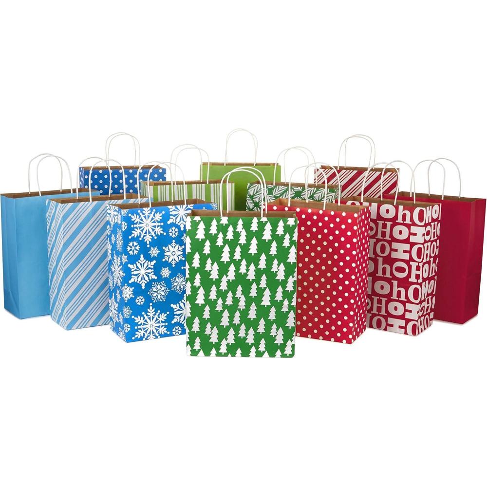 imageHallmark 13quot Large Gift Bag Assortment Holiday Icons 12 Paper Gift Bags in Assorted Designs for Hanukkah or Christmas Stripes Polka Dots Snowflakes Christmas Trees