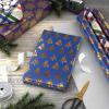 Hallmark Christmas Wrapping Paper with Cutlines on Reverse (3 Rolls: 120 Sq. Ft. Total) Winter City Scene, Rustic Snowflakes on Red, Nutcrackers with Foliage(Gold Snowflakes on Purple  Jewel-Tone Trees  Plaid Stripes)