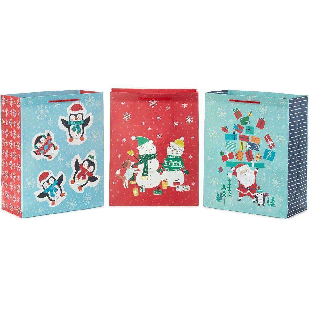 imageHallmark 13quot Large Christmas Gift Bags for Kids 3 Bags Santa and Puppy Santa in RV Colorful CandyPenguins Snowman Santa