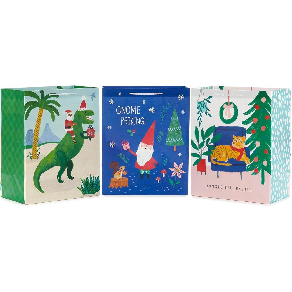 imageHallmark 13quot Large Christmas Gift Bags for Kids 3 Bags Santa and Puppy Santa in RV Colorful CandyTRex Gnome Jungle Cat