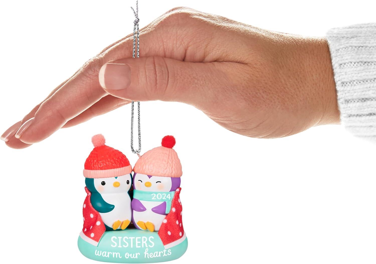 imageHallmark Keepsake Christmas Ornament 2024 Sisters Warm Our Hearts 2024 Family GiftsSisters Warm our Hearts