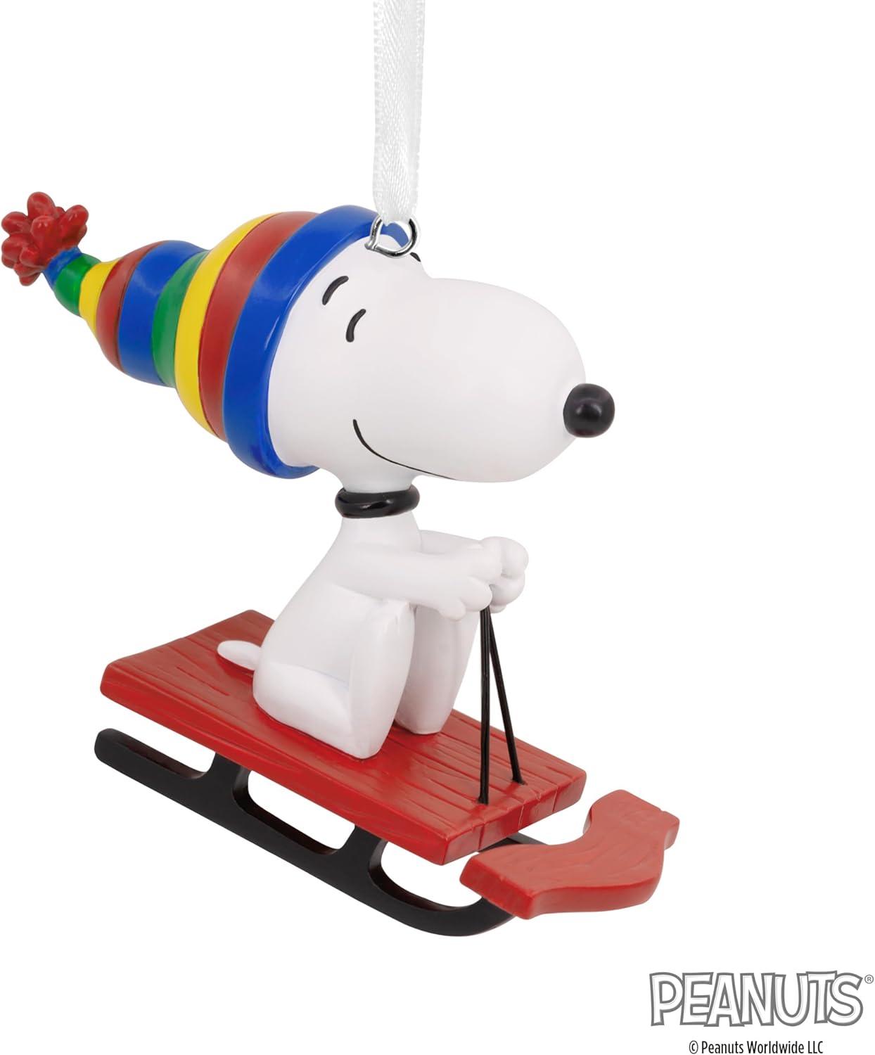 imageHallmark Peanuts Snoopy on Doghouse Christmas Ornament with LightSnoopy Sledding