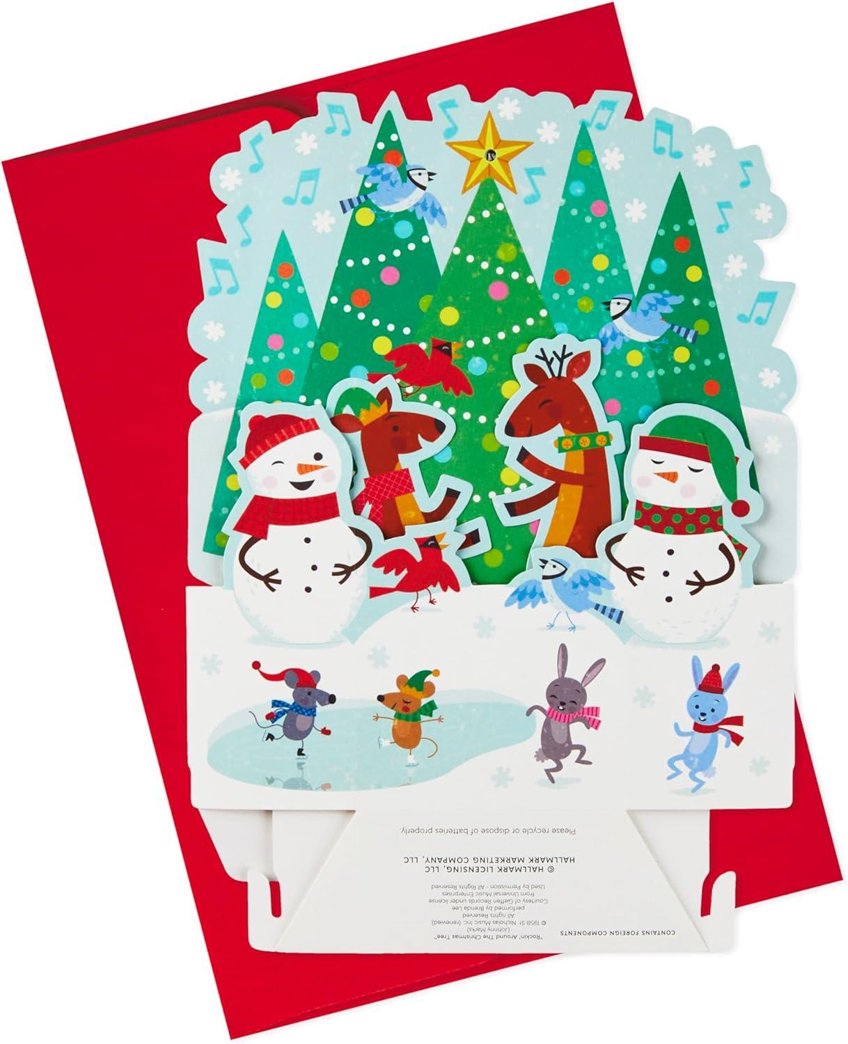 imageHallmark Paper Wonder Pop Up Christmas Card with Lights and Music Plays Rockin Around the Christmas TreeSnowman Plays Rockin Around the Christmas Tree