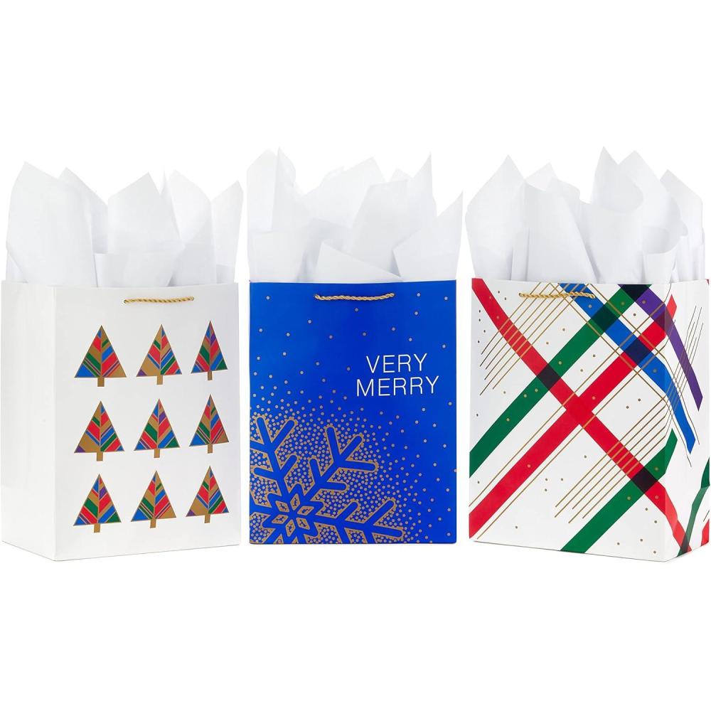 image:imageHallmark 15 Christmas Gift Bags 2 Extra Large Bags Pink and Blue Penguins Hedgehogs Santa Snowmen Dog Bunny Rabbits for Kids Grandchildren Winter Baby ShowersLarge