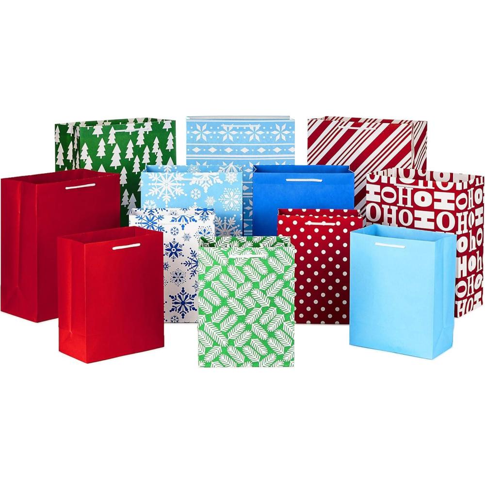 image:imageHallmark Christmas Gift Bags Assorted Sizes 12 Bags 5 Medium 8 4 Large 11 3 Extra Large 14 Red Blue Green Solids Snowflakes Stripes12 Piece Assortment