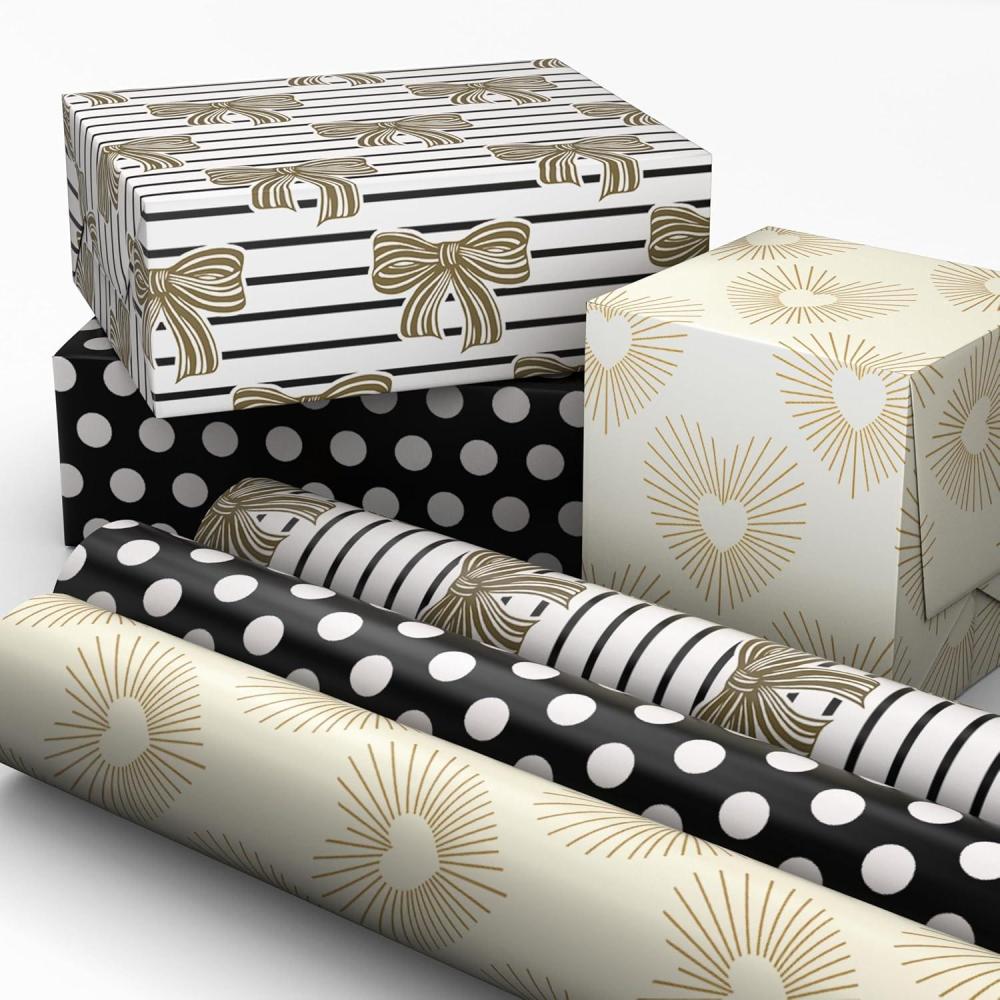 image:imageHallmark Wedding Wrapping Paper Mini Rolls 3Pack Gold Hearts Bows Black and White Stripes Dots for Bridal Showers Graduations Valentines Day Any Occasion  60 Sq Ft TotalGold Hearts  Bows  Polka Dots 3 Mini Rolls